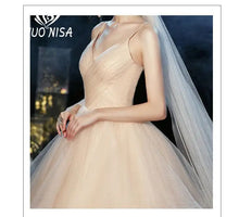 Load image into Gallery viewer, Wedding dress Sexy Deep V Neck Ball Gowns Spaghetti Straps Off White Champagne Tulle Bridal Dress
