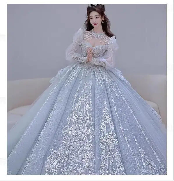 Long Sleeved Exquisite Shiny light blue Wedding Dress Embroidered Lace Sequined Vintage Bridal Gown With Bow And Beading