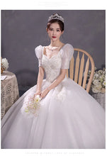 Load image into Gallery viewer, Ball Gown Wedding Dresses Off The Shoulder Wedding Gowns Elegant Appliques Beaded Bridal Dress Plus Size Vestidos De Novia 2023
