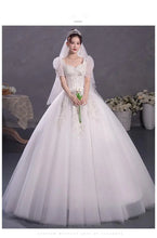 Load image into Gallery viewer, Ball Gown Wedding Dresses Off The Shoulder Wedding Gowns Elegant Appliques Beaded Bridal Dress Plus Size Vestidos De Novia 2023
