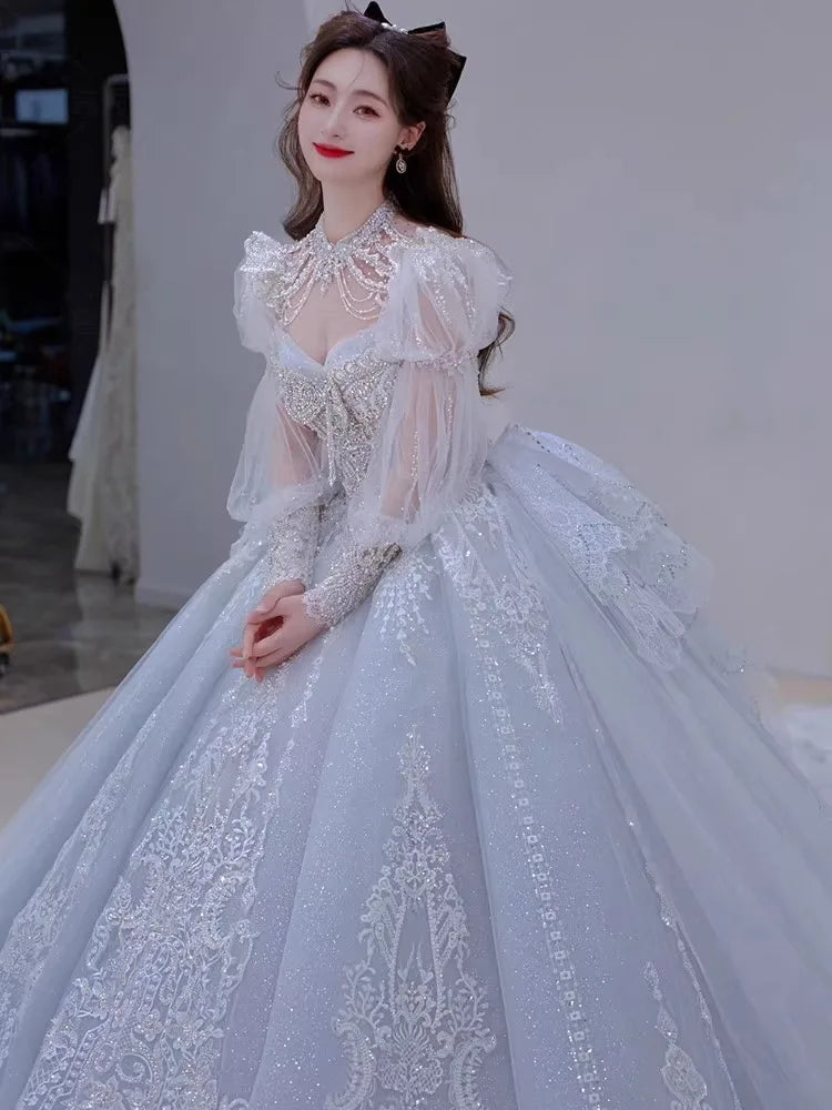 Long Sleeved Exquisite Shiny light blue Wedding Dress Embroidered Lace Sequined Vintage Bridal Gown With Bow And Beading