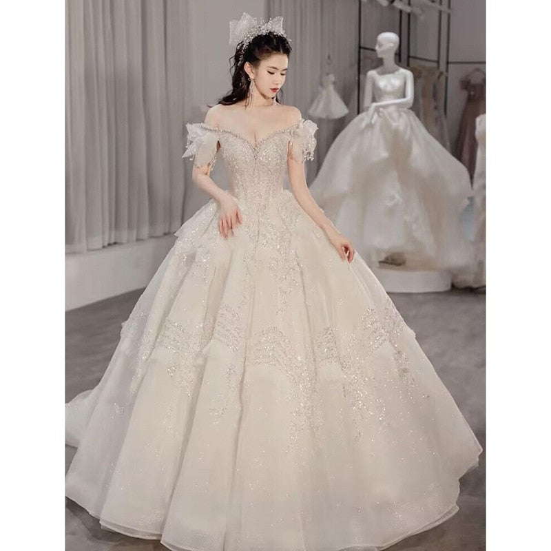 Off The Shoulder Luxury Wedding Dress With Pearls Lace Up Sexy Sleeveless Bride Ball Gown Vestido De Noiva Sweep Train