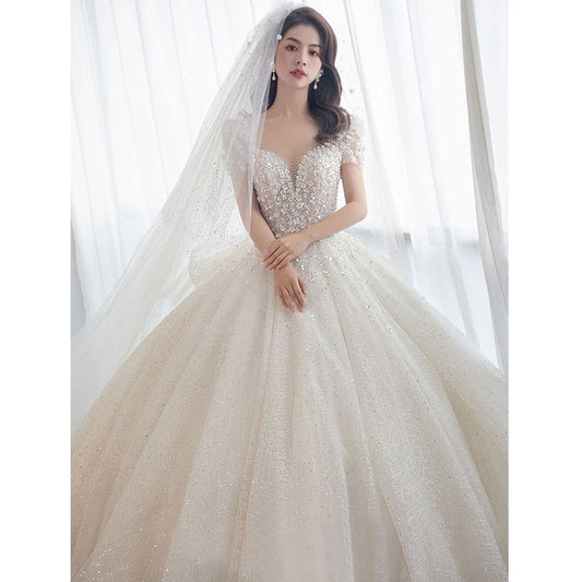 Luxury Short Sleeve Wedding Dress 2023 New Bridal Dress V Neck Beading Shinning Ball Gown Sweep Train